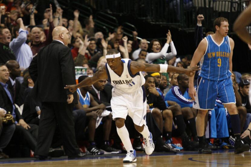 Jason Terry celebrates after hitting a three-point shot against New Orleans in a game on...