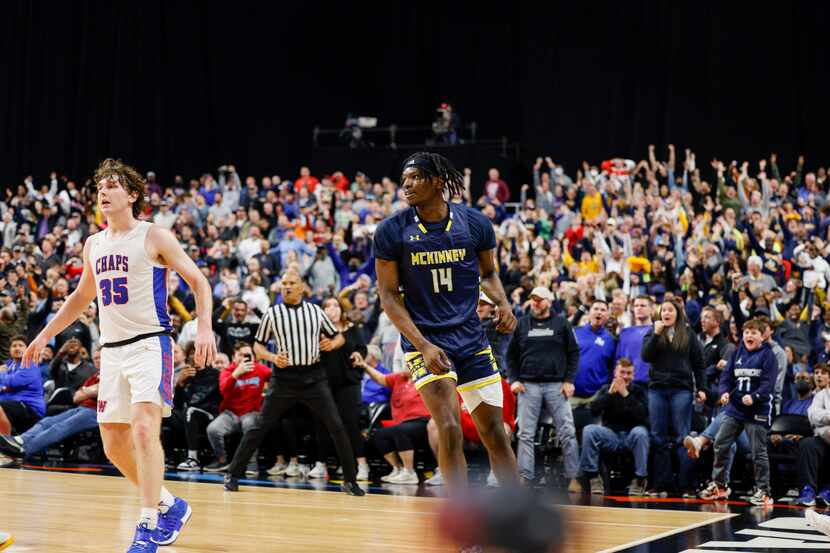 McKinney guard Alex Anamekwe (14) watches on after the game-winning dunk during the second...