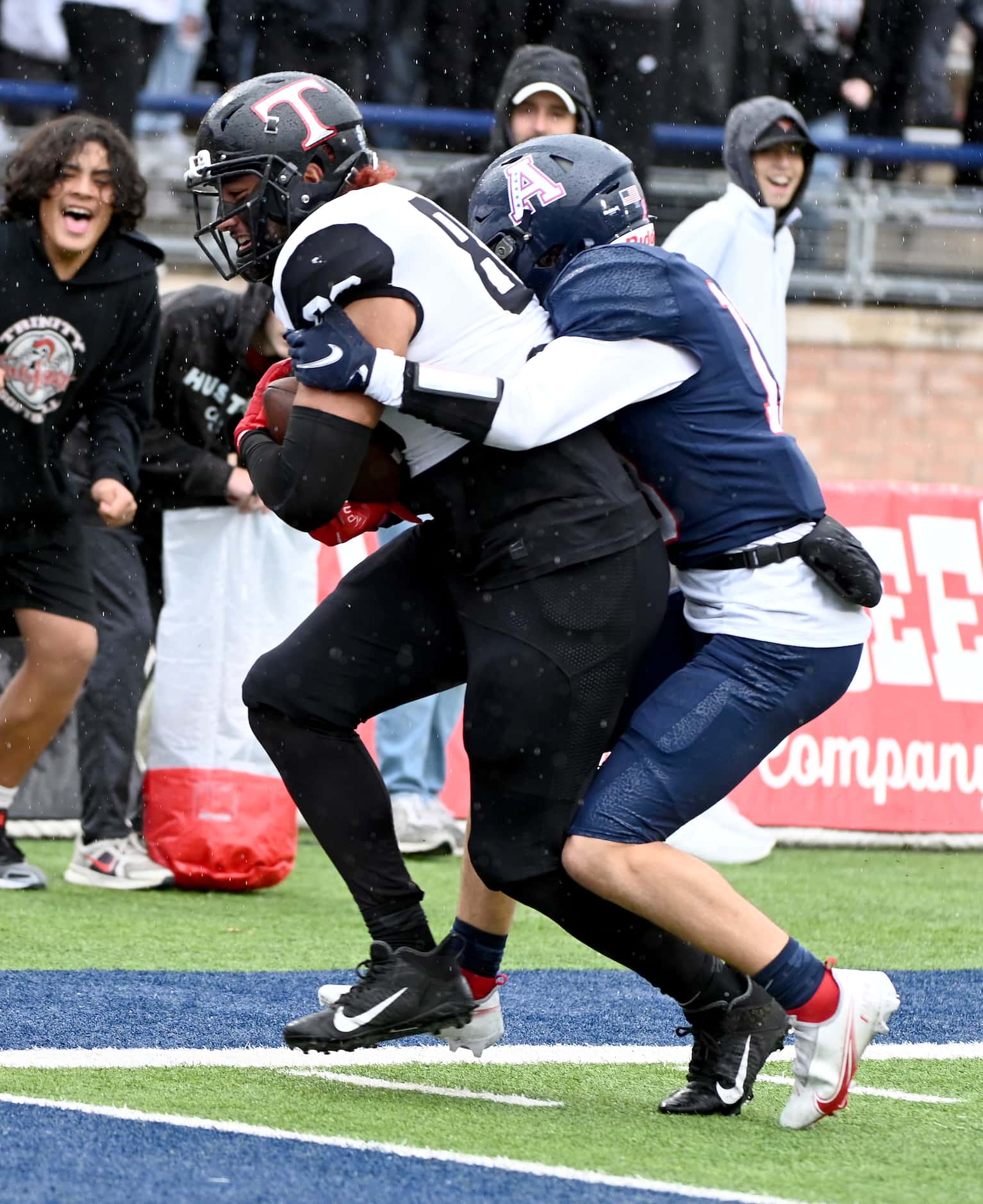 Euless Trinity's Junior Tuipulotu (86) catches  touchdown pass in front of Allen’s Caden...