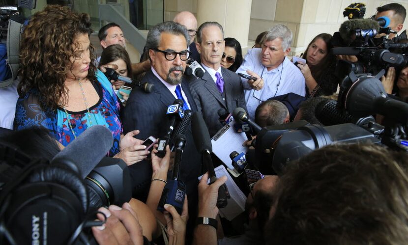 Special prosecutors Kent Schaffer, left, and Brian Wice respond to questions from the news...