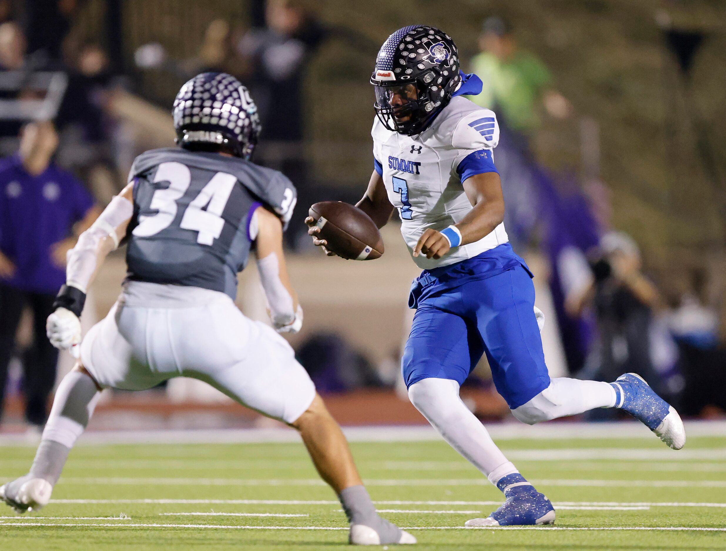 Mansfield Summit quarterback David Hopkins (7) carries the ball against College Station...