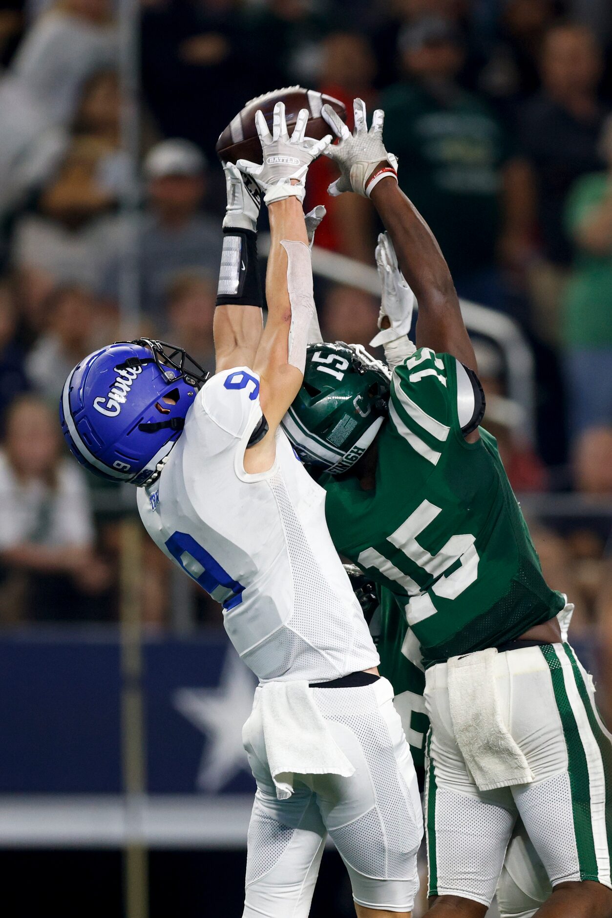 Gunter wide receiver Cole Lemons (9) reaches over Franklin defensive back Bryson Washington...