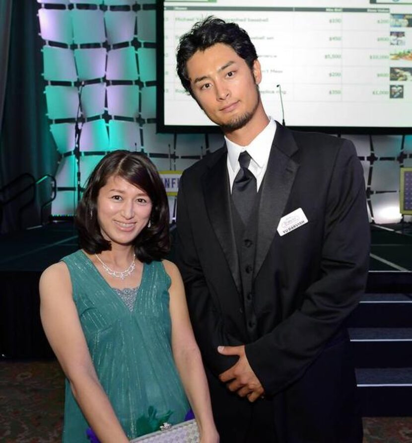 
Mika Fujita of Irving with Texas Rangers pitcher Yu Darvish at Texas Rangers Foundation...