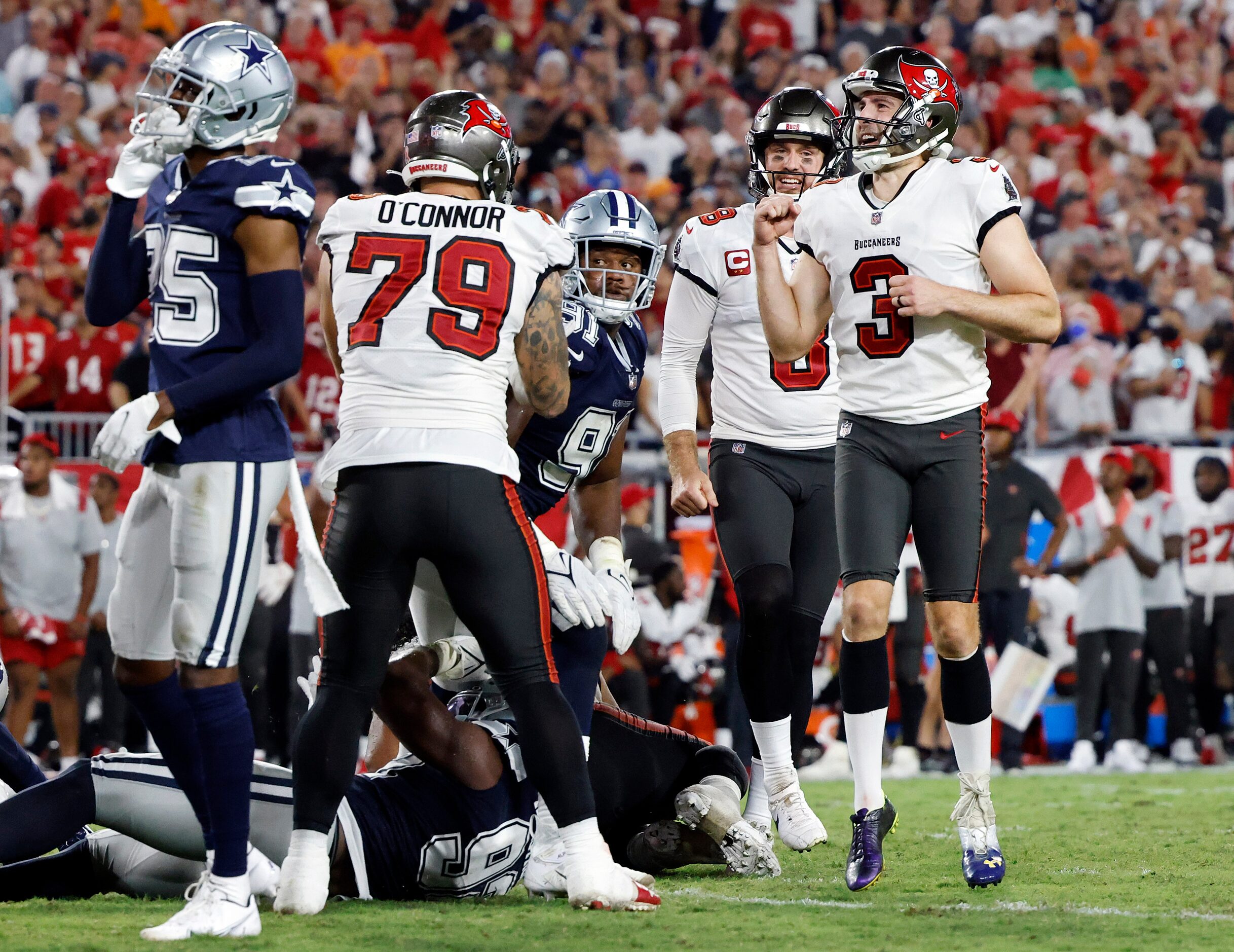 Tampa Bay Buccaneers place kicker Ryan Succop (3) reacts after kicking the winning field...