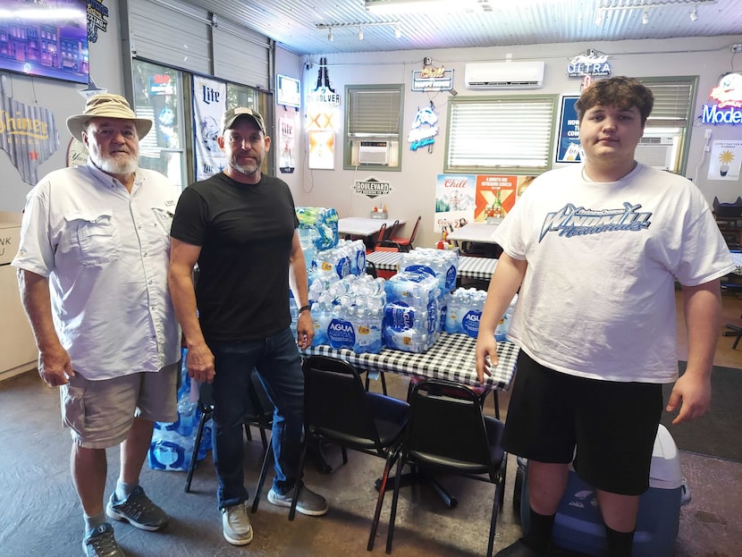 Travis Middlebrooks, middle, opened York 'N Ale Burgers, a local restaurant and bar, two...