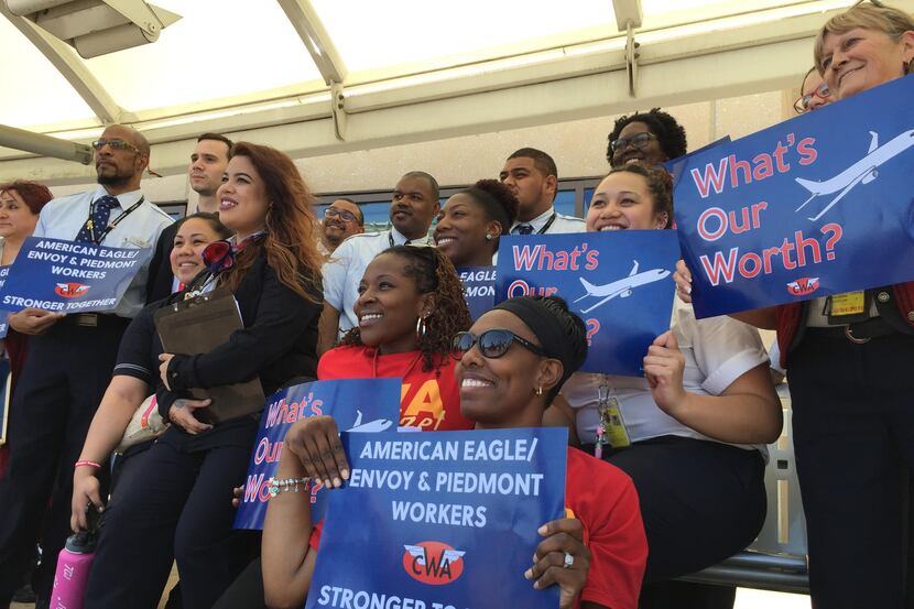  Employees for Envoy, an American Airlines subsidiary, picketed for better pay Wednesday...
