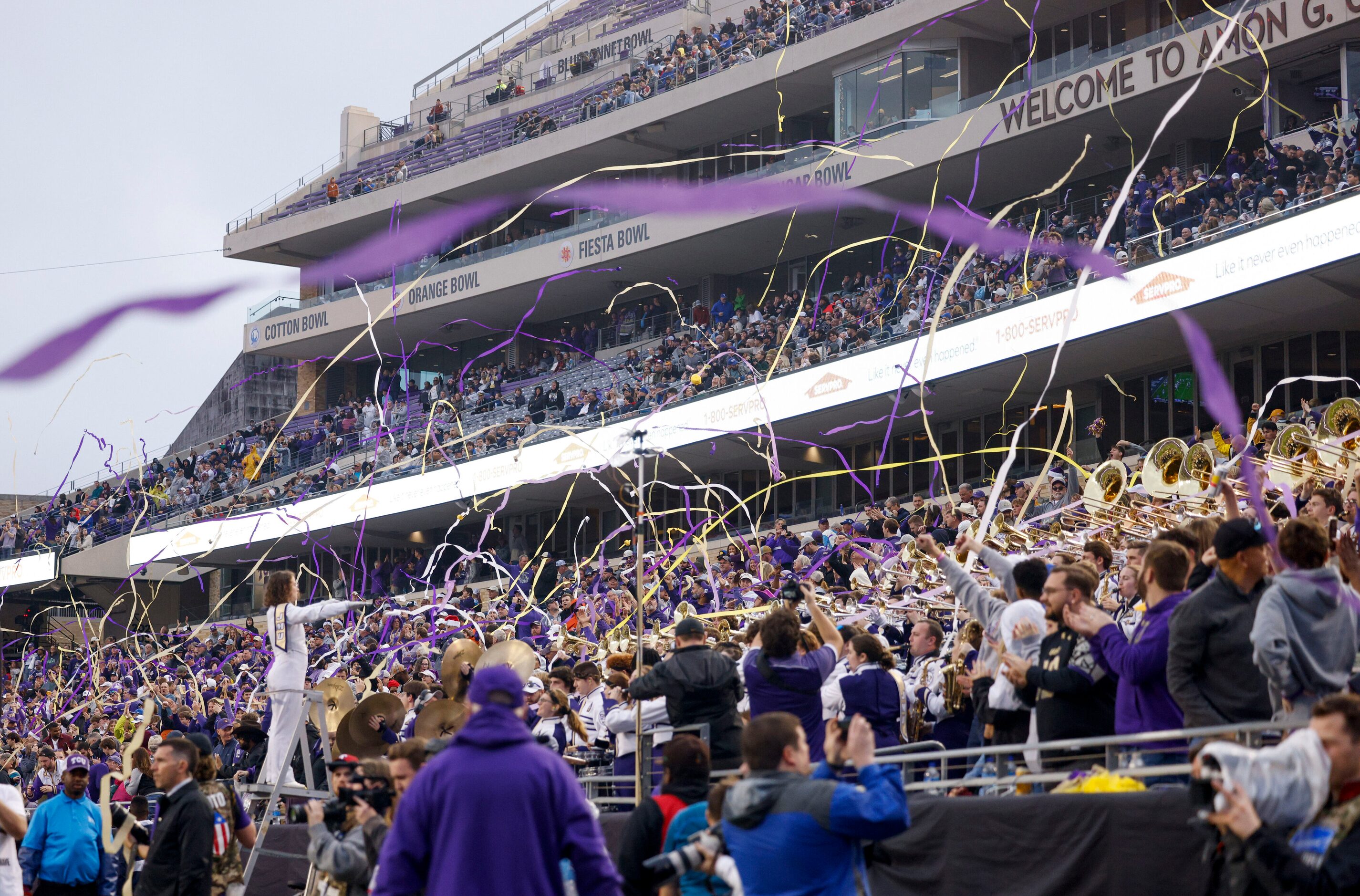 James Madison Dukes fans throw streamers as they celebrate a touchdown during the second...