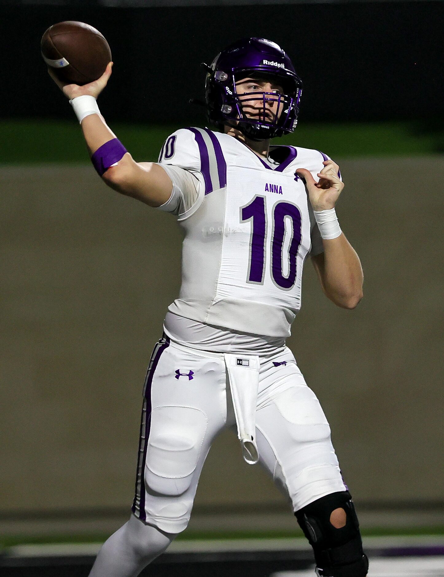 Anna quarterback Evan Bullock attempts a pass against China Spring during the first half of...