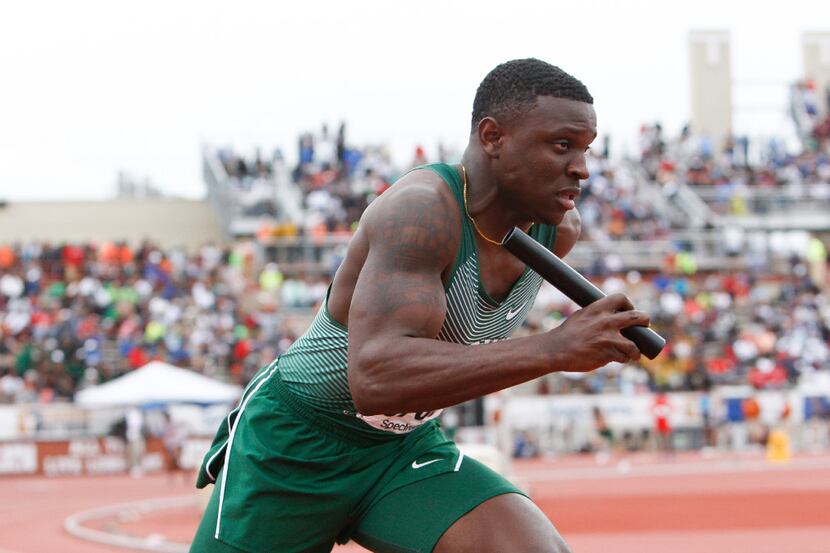 Waxahachie's Jalen Reagor, right, leaves the starting blocks during the boys 4x200 meter...