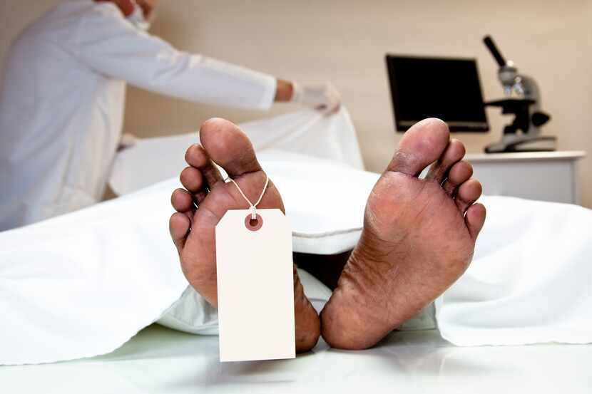 Photo illustration of a toe tag on a cadaver.