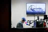 Voice of Vietnamese Americans, VVA 1600 AM, announcer Minh Tuan talks in their radio studio,...