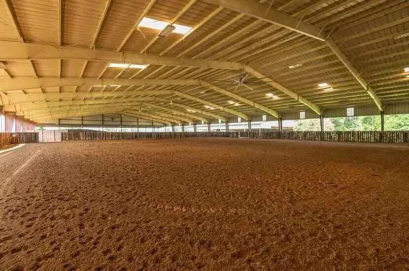 Rio Neches Ranch near Tyler has an equestrian arena and large barn.