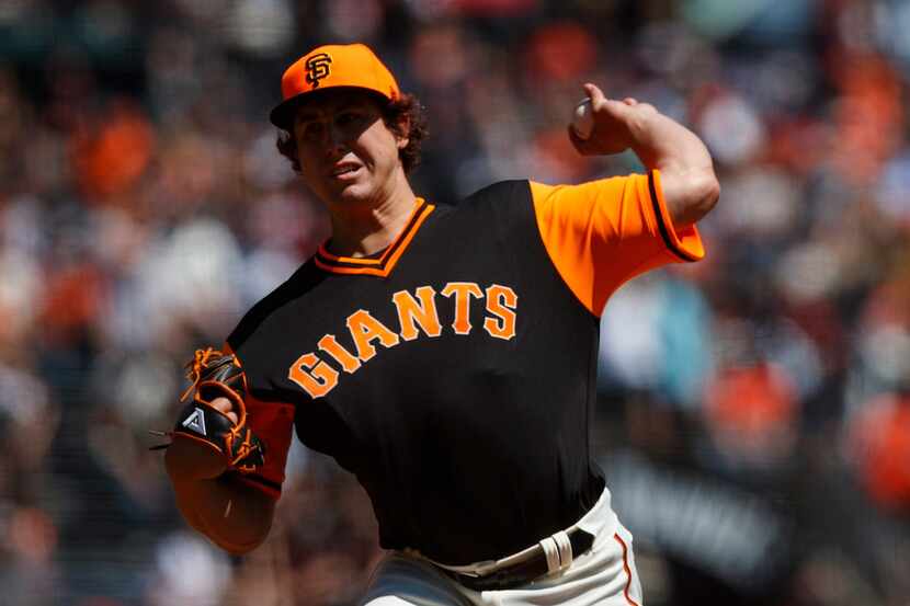 SAN FRANCISCO, CA - AUGUST 26: Derek Holland #45 of the San Francisco Giants pitches against...