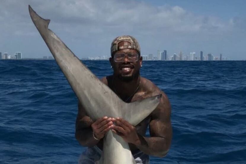 Von Miller and his fishing mates say they released a hammerhead shark back into the water...