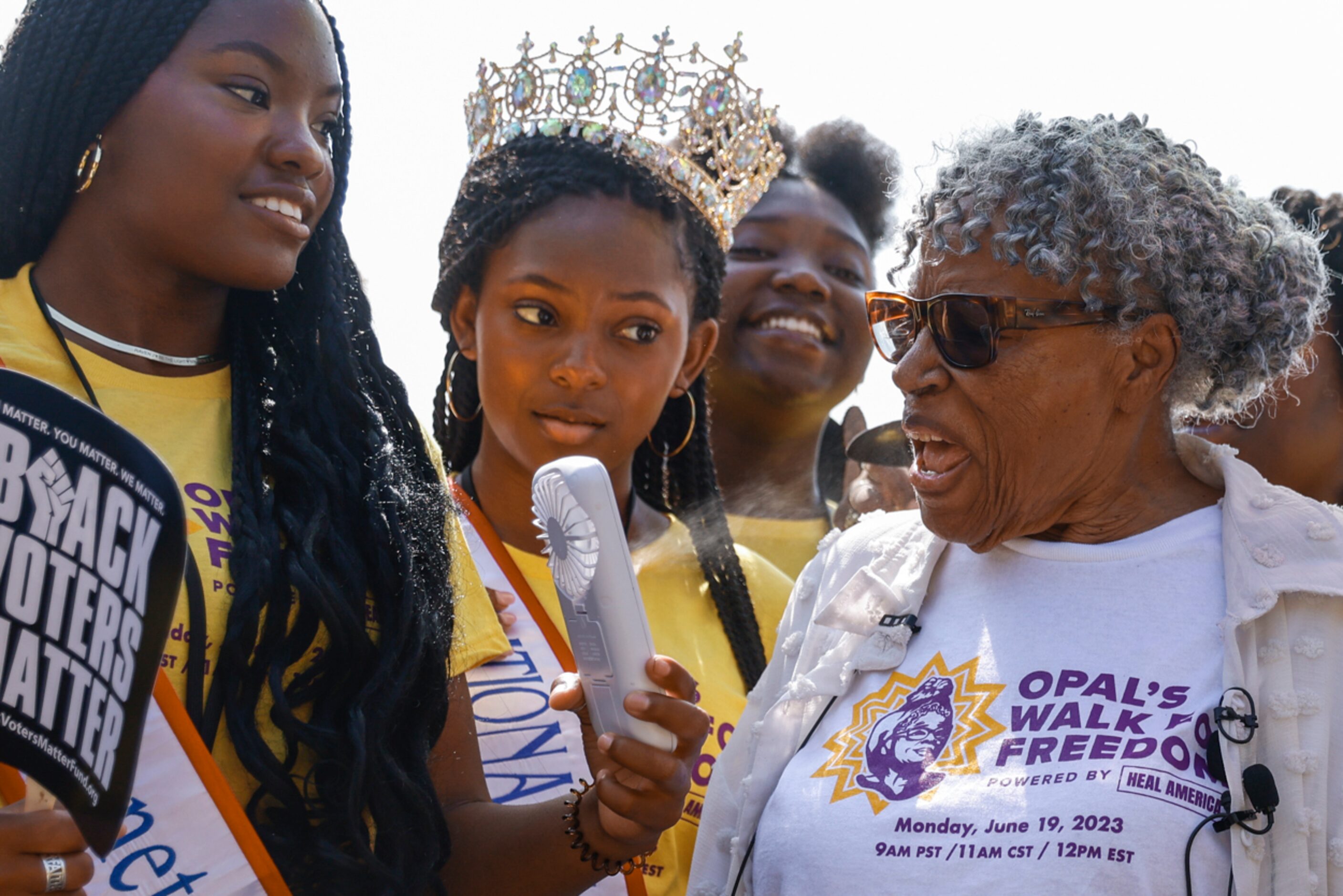 Raven Johnson, left, Miss Juneteenth DFW 2023, and Madison Corzine, center, National Miss...