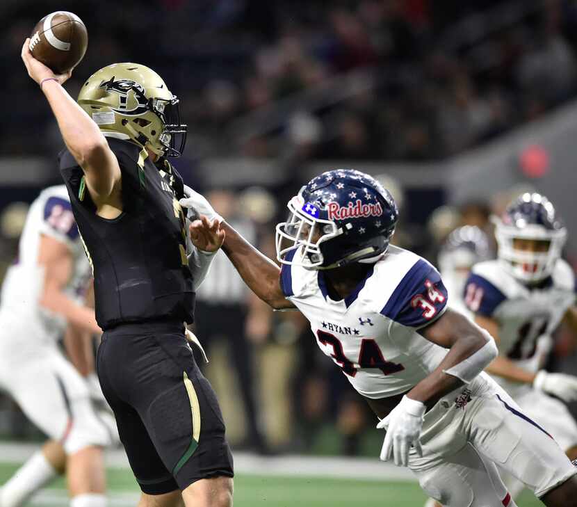 Denton Ryan-Birdville game.
Ryan defensive end Del'Shun Neal (34) pressures Birdville...