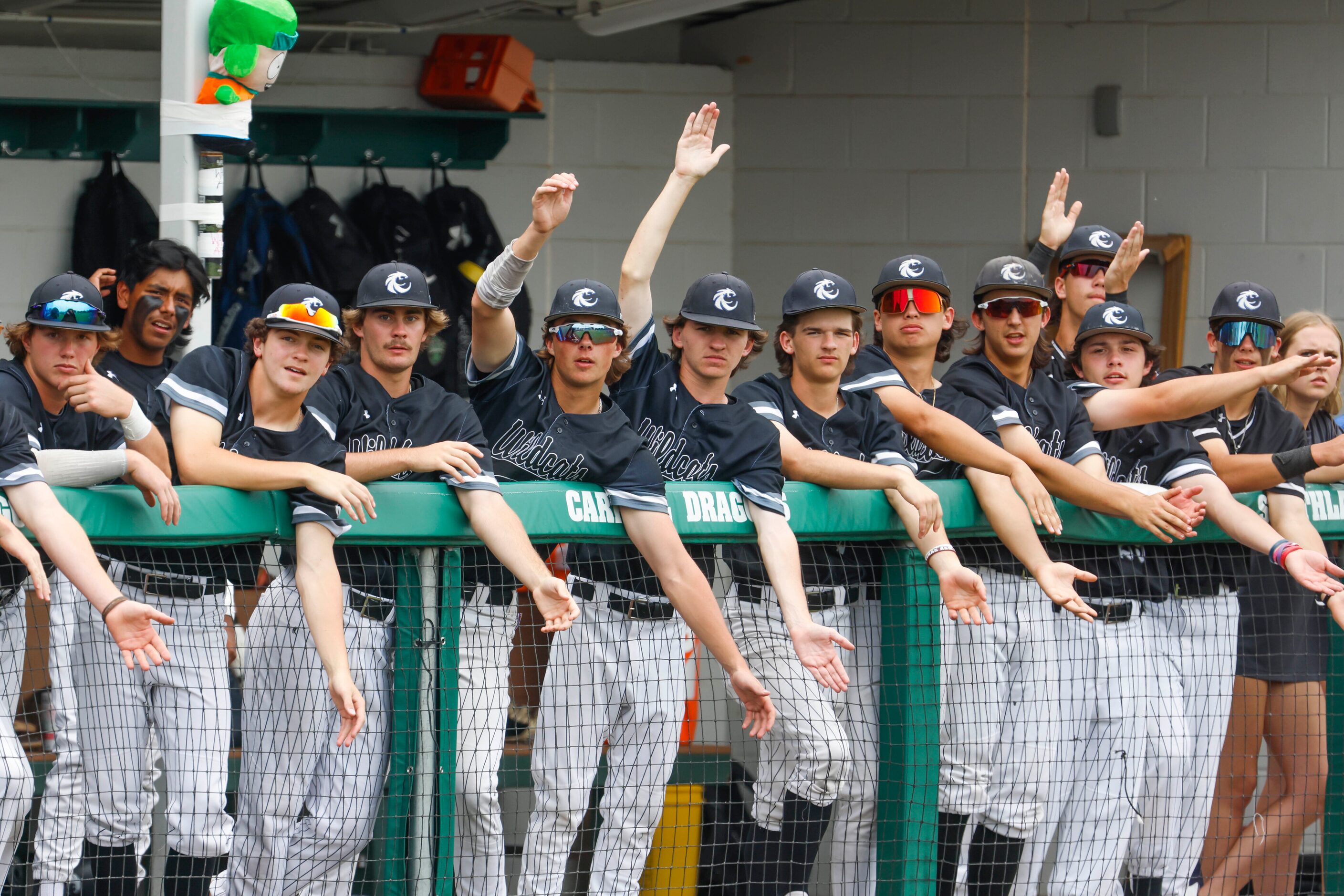 Denton Guyer players cheer from the dugout during a baseball game against Byron Nelson High...