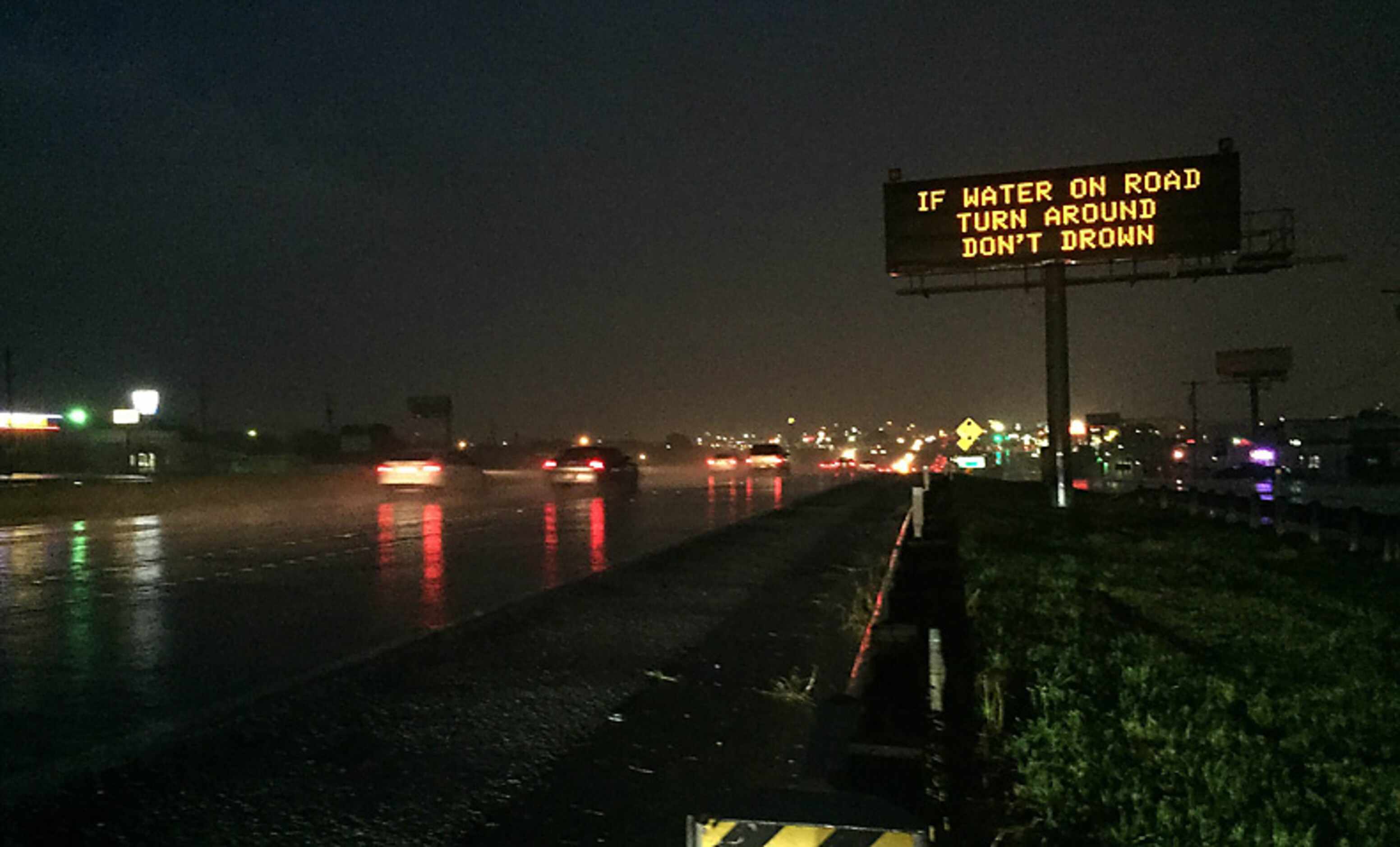 A TxDOT electronic sign warns commuters of possible flooding  on Highway 67 near the...