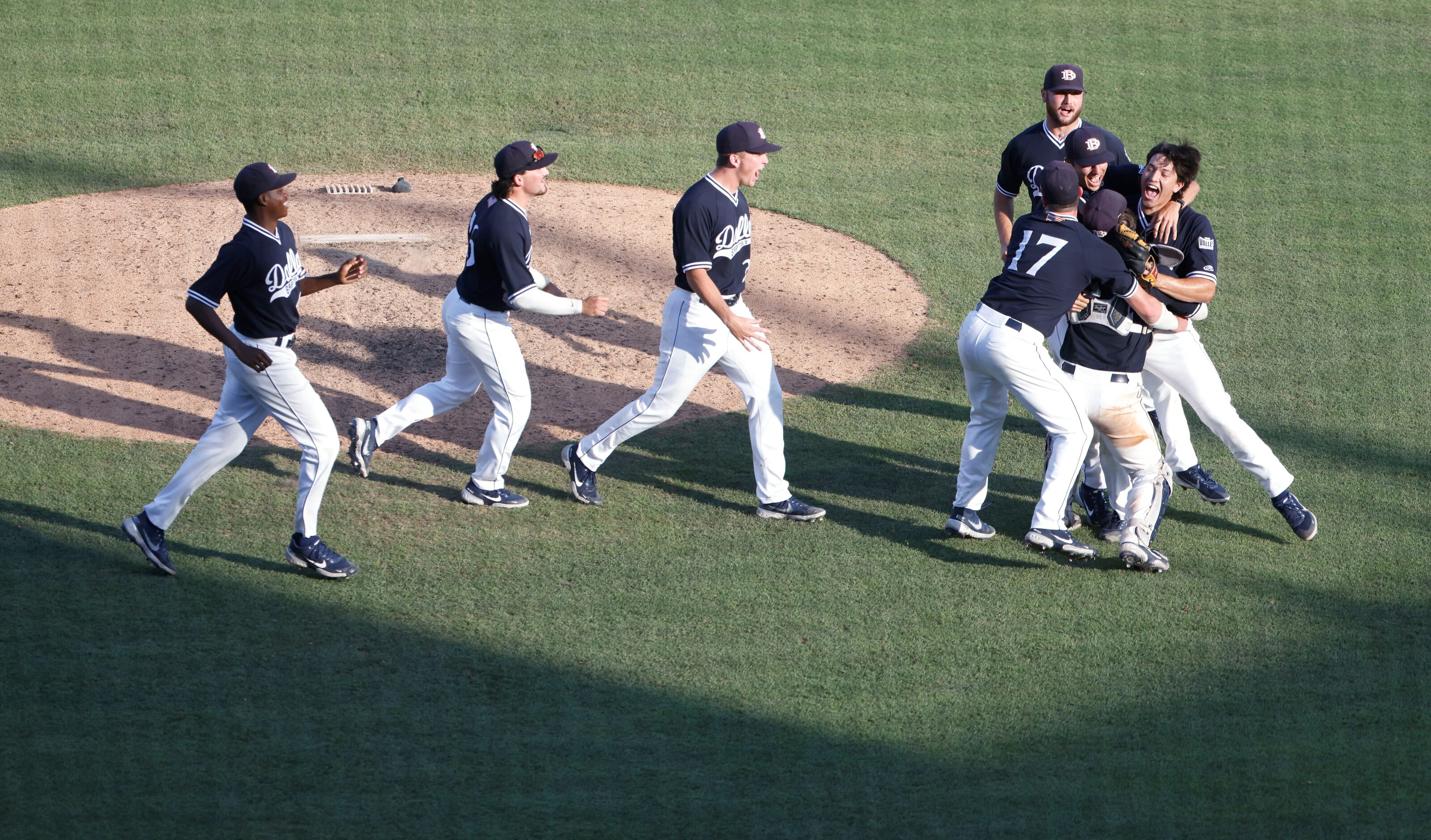 Dallas Baptist celebrates their 8-5 win over Oregon St. following the NCAA Division I...