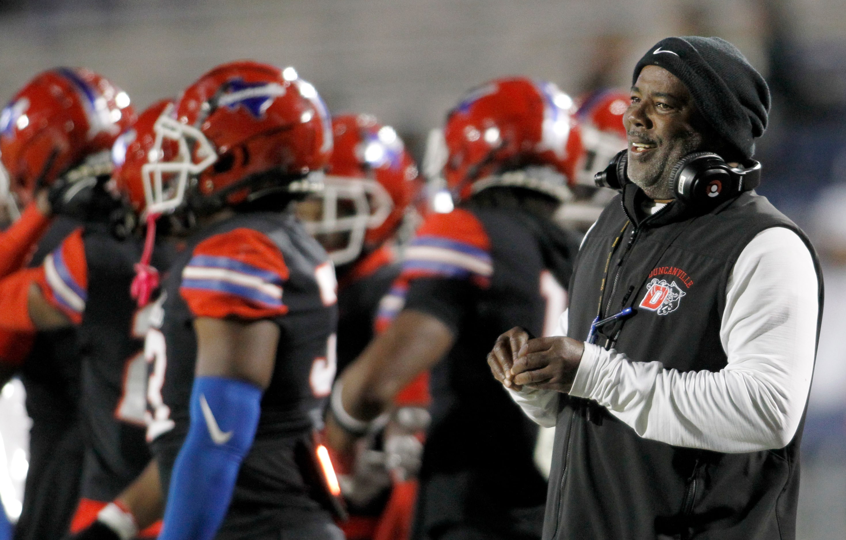 Duncanville head coach Reginald Samples, right, was all smiles after the Panthers scored a...