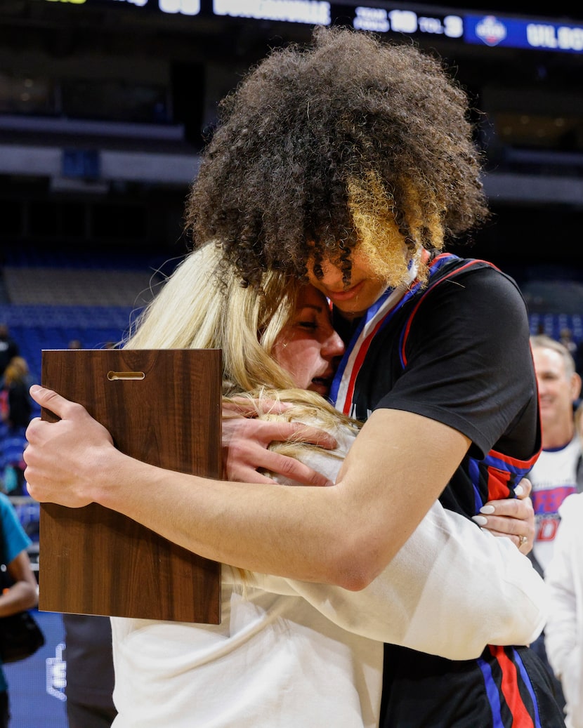 Duncanville guard Anthony Black (0) hugs his mother Jennifer Black after winning the Class...