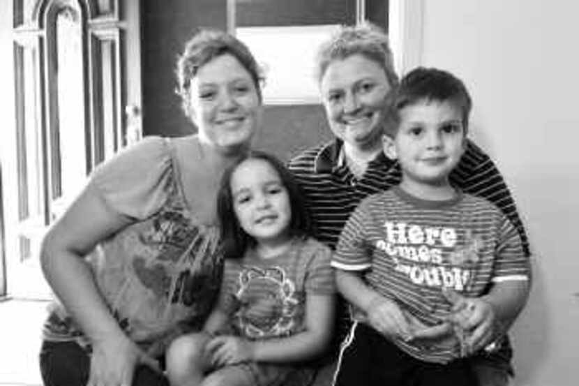  Jill (left) and Tracy Harrison, with their children, Olivia, 4, and Spencer, 2, had...
