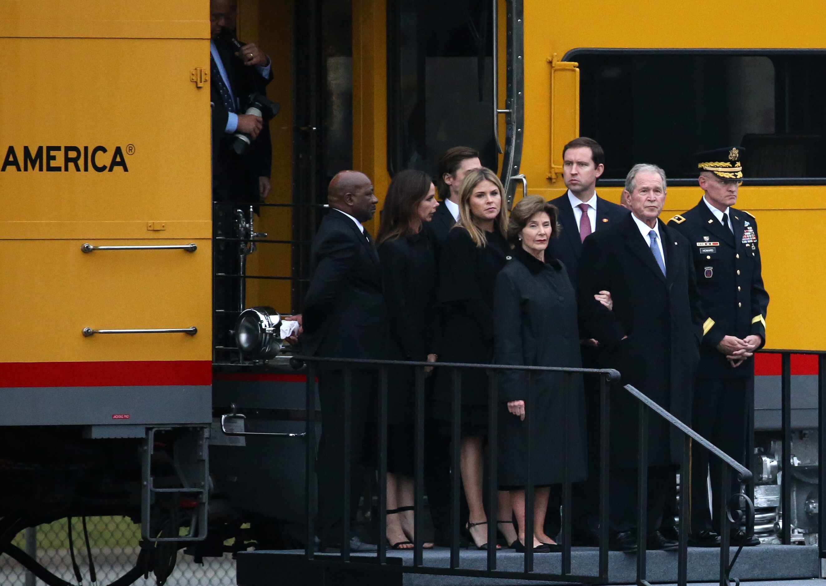Former President George W. Bush and Laura Bush and their daughters are among family exiting...