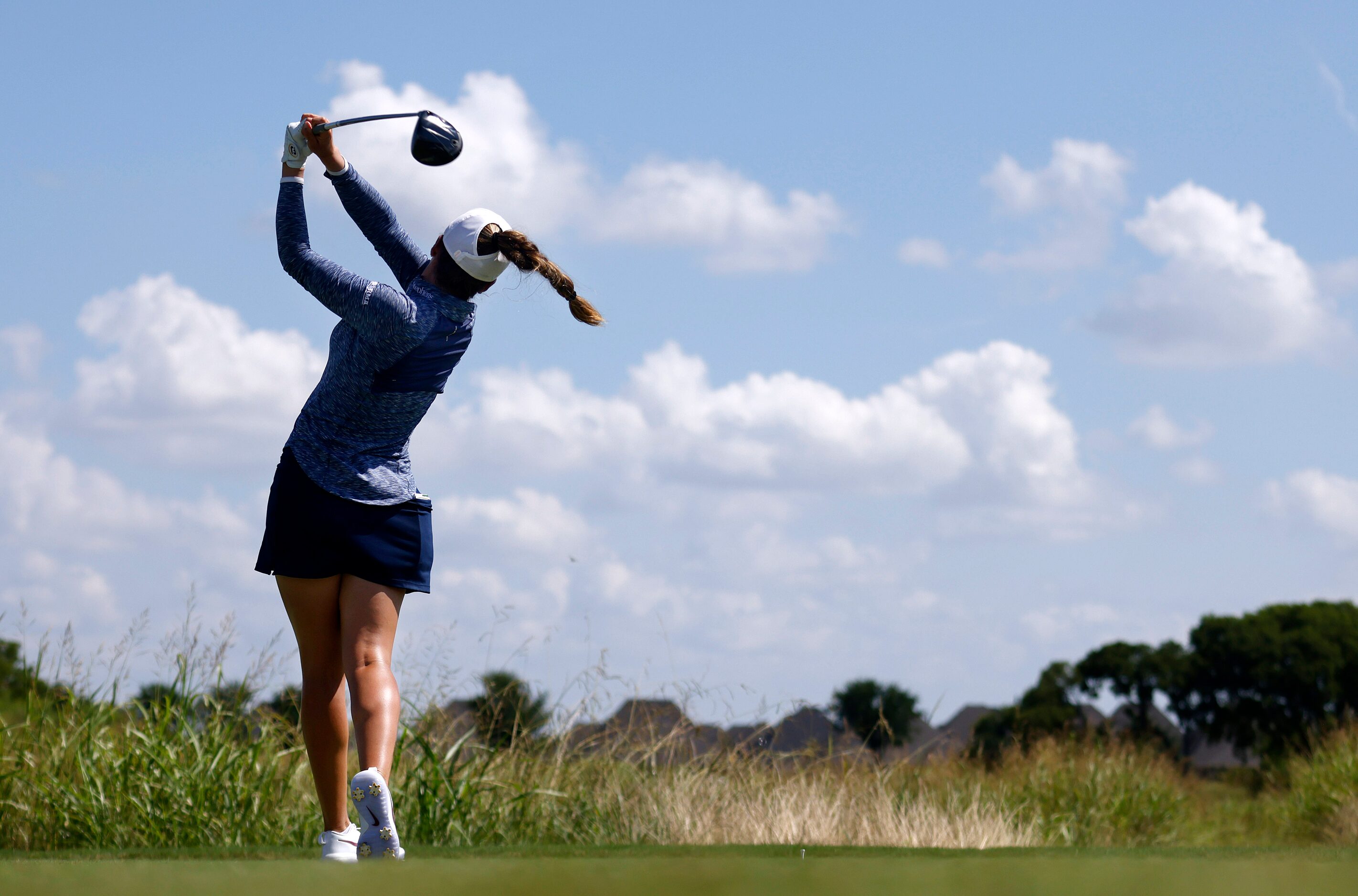 Professional golfer Gaby Lopez follows through on her drive on No. 1 during the opening...