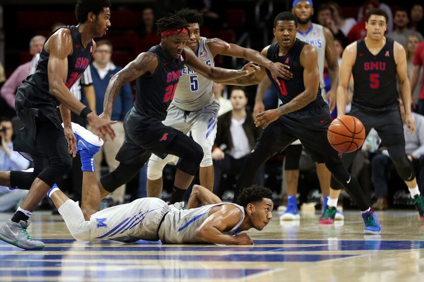 Memphis guard Jamal Johnson (1) loses the ball against Southern Methodist during the second...