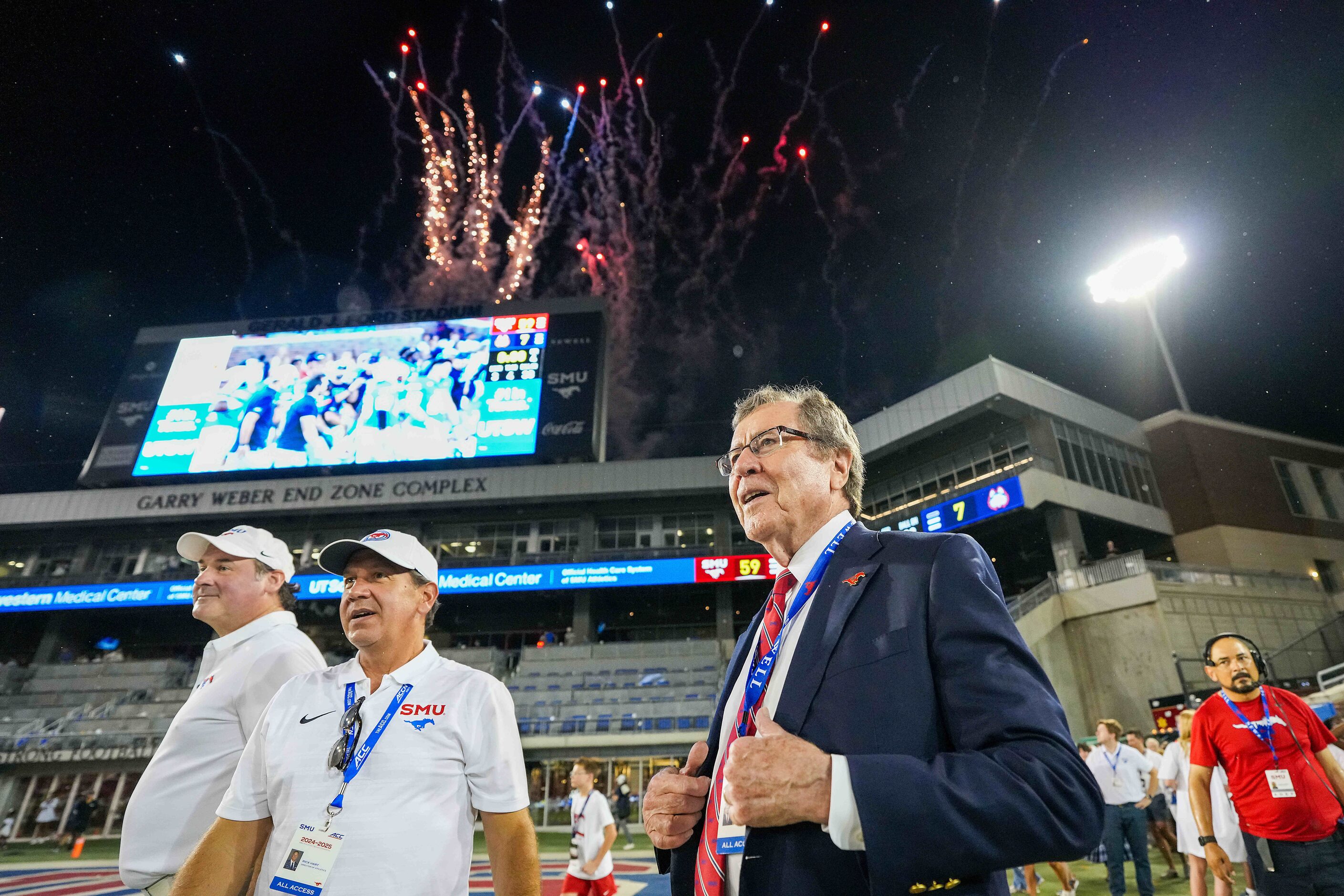 SMU president R. Gerald Turner looks out on the field as fireworks go off over the new Garry...