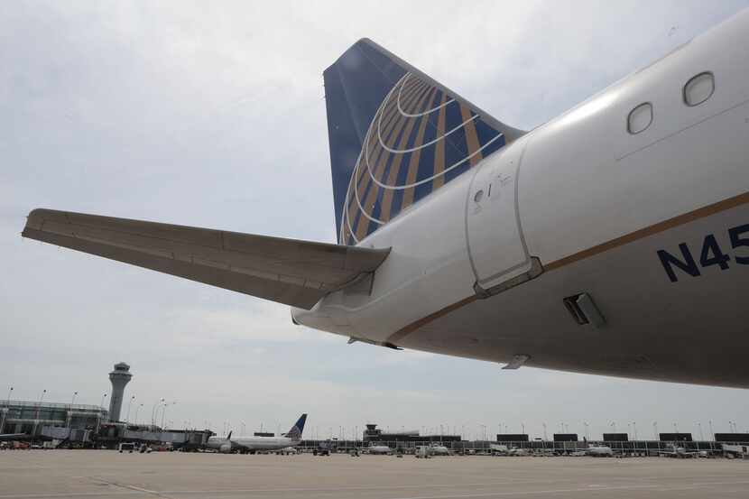 United Airlines jets sit at gates at Chicago O'Hare International Airport in July 2018....