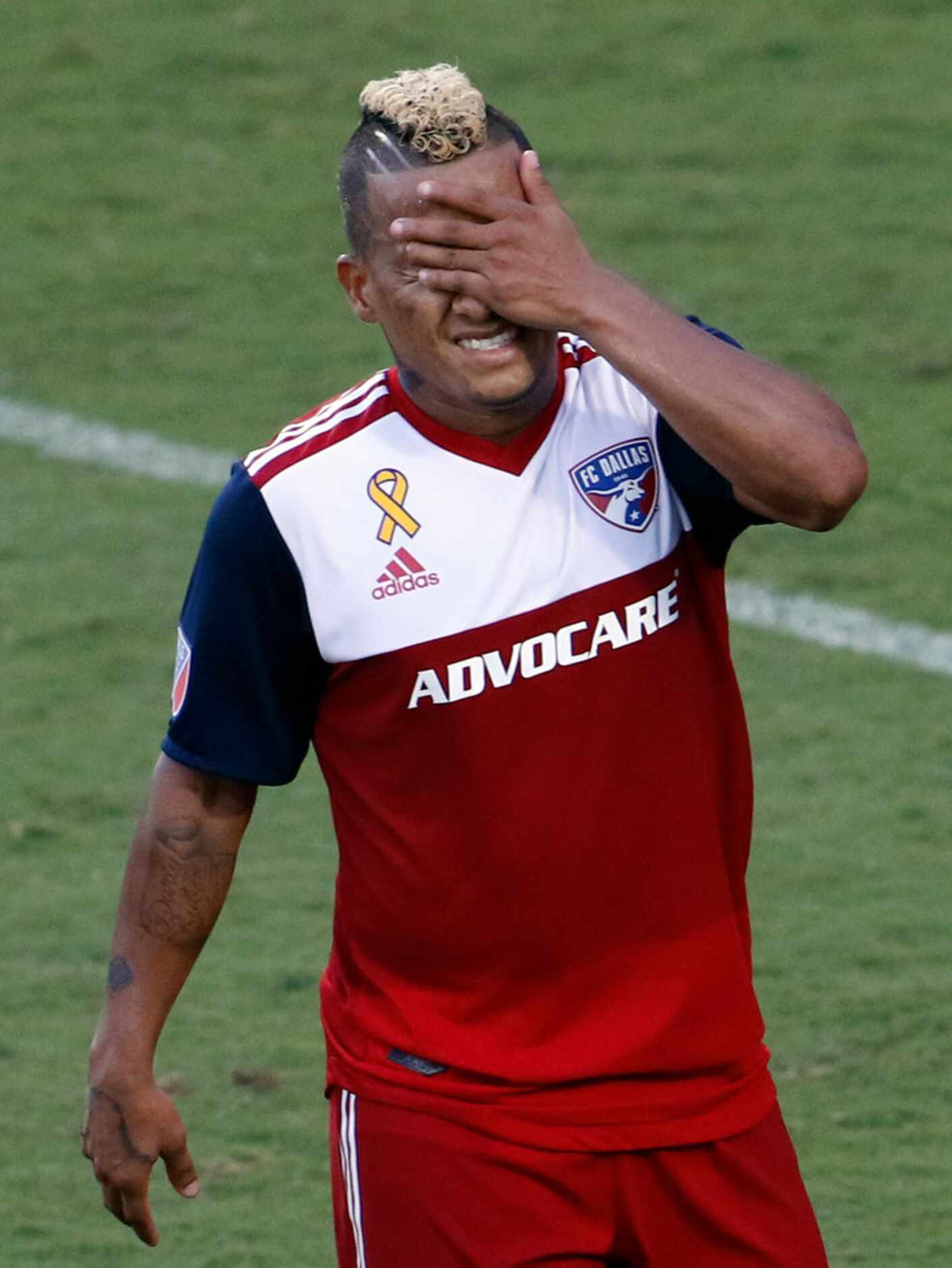 FC Dallas midfielder Michael Barrios (21) reacts after missing a scoring attempt late in the...