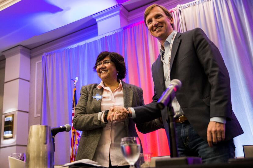 Democrat gubernatorial candidate and former Dallas Sheriff Lupe Valdez, left, shakes hands...