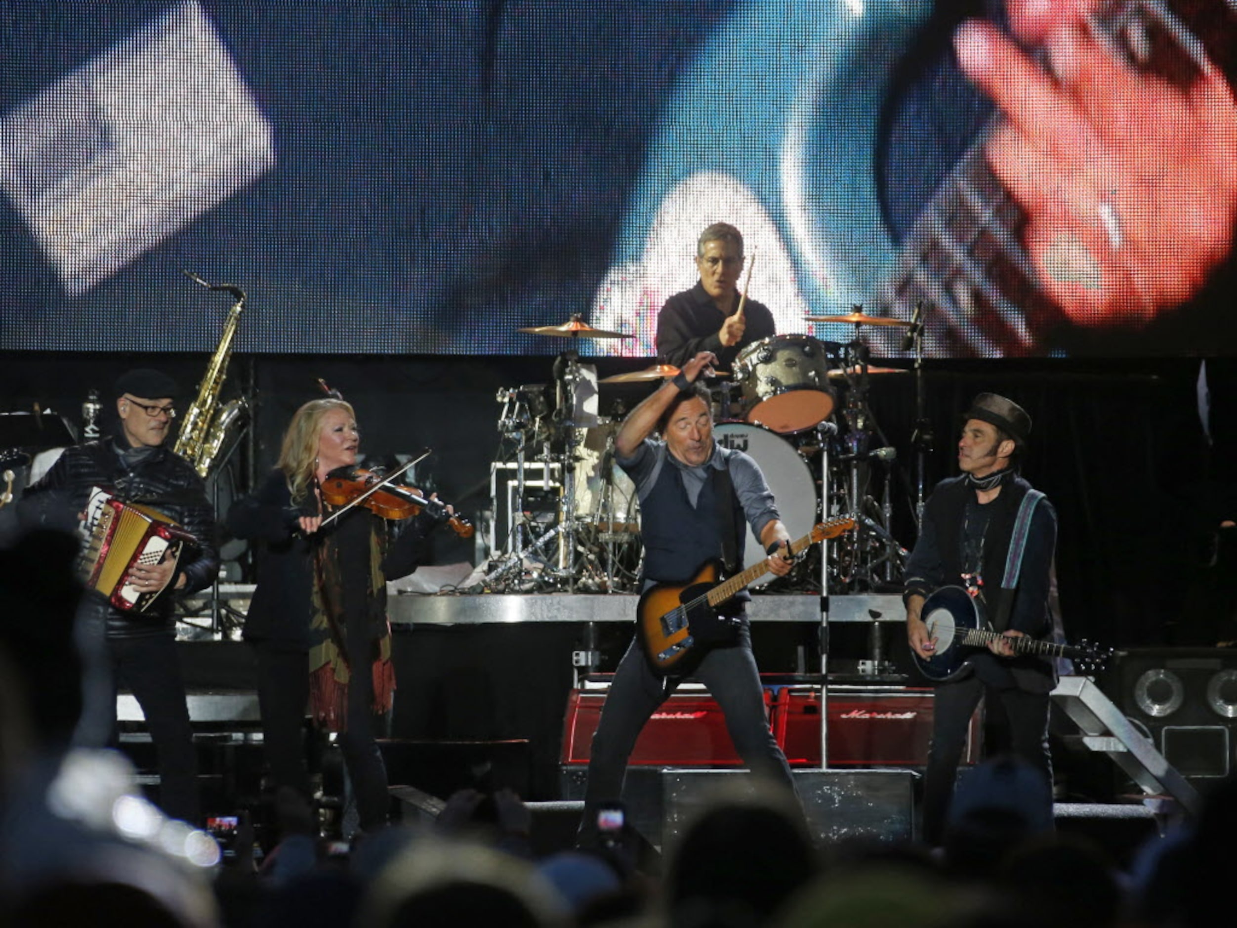 Bruce Springsteen and the E Street band perform during the March Madness Music Festival in...