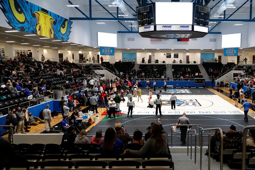 The gym used three matts for the competition during the UIL Region II wrestling meet held at...