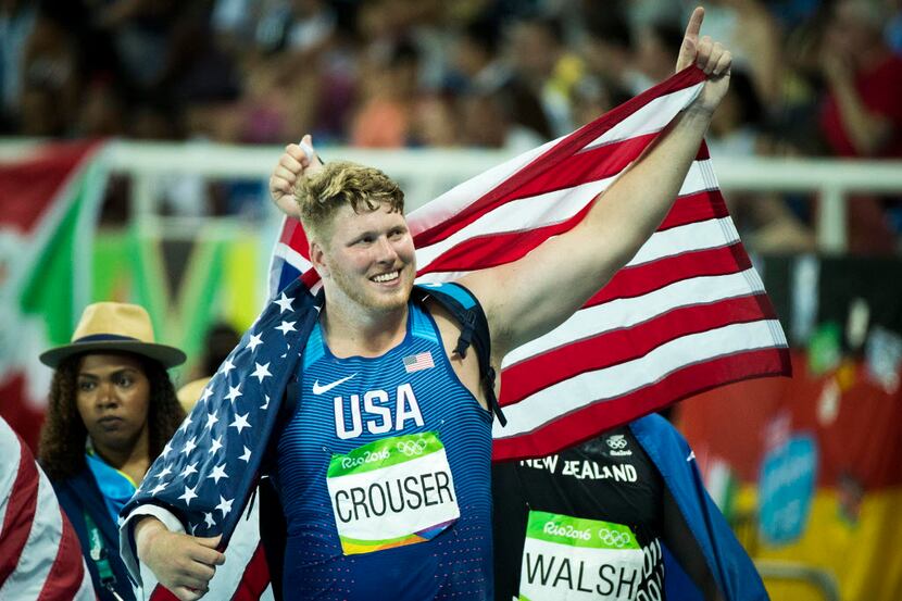 Ryan Crouser of the USA celebrates after winning the men's shot put final at the Rio 2016...
