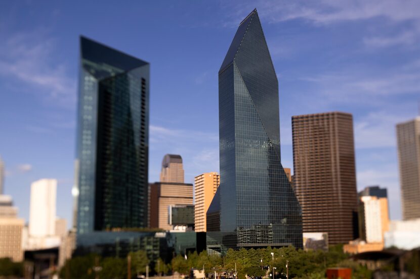 The exterior of 45-story AMLI Fountain Place apartment tower (left) and the 60-story...