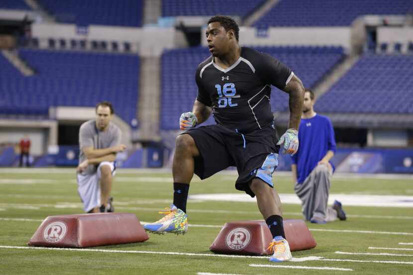 Texas Tech defensive lineman Kerry Hyder runs a drill at the NFL football scouting combine...