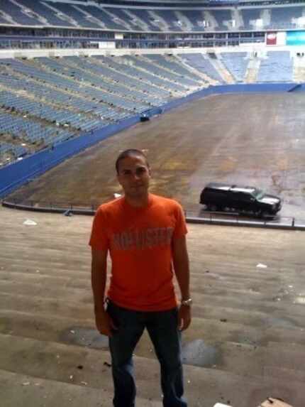 Javier Ortiz Rivera tours the old Texas Stadium site before his final deployment to...
