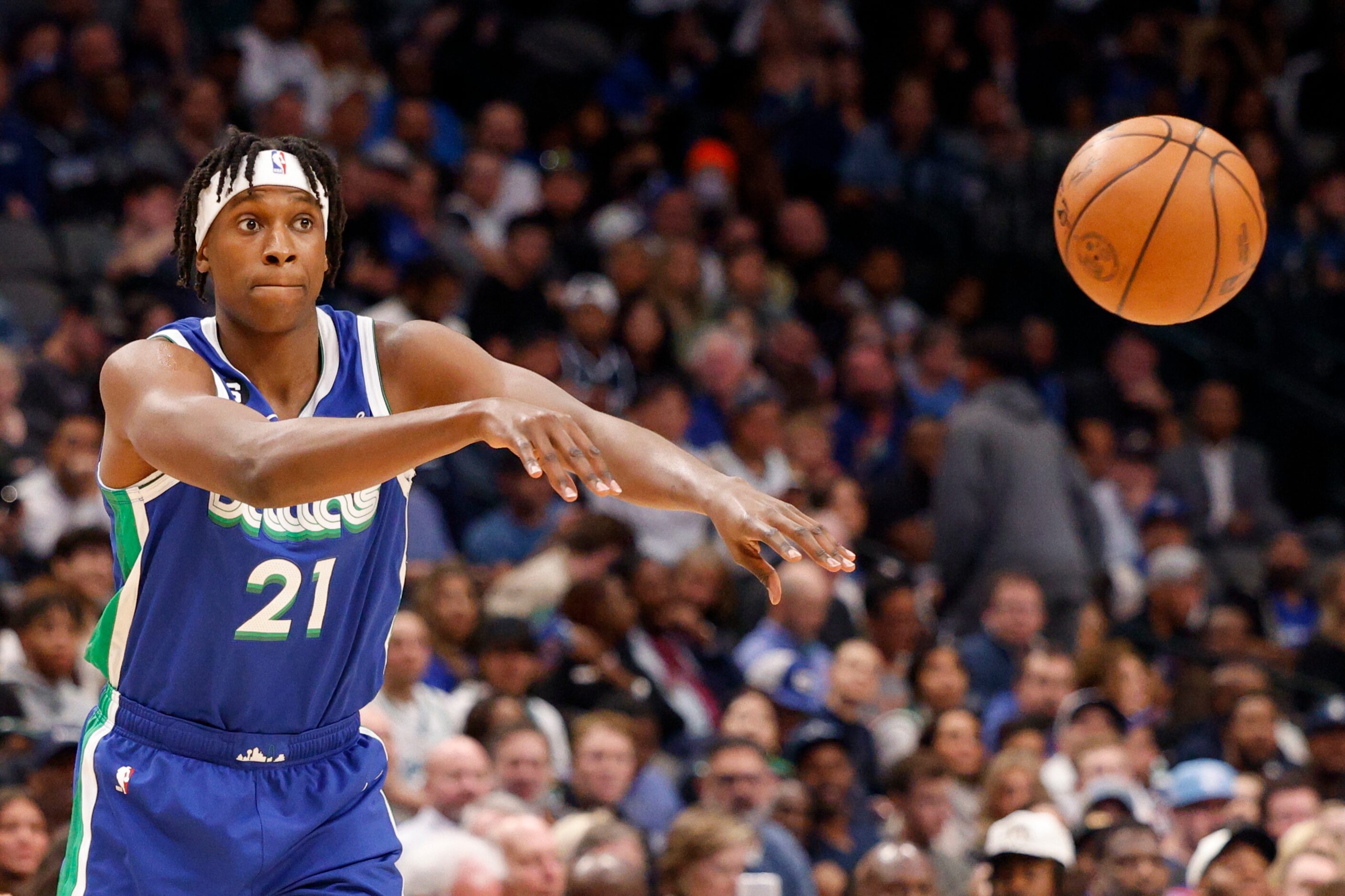 Dallas Mavericks guard Frank Ntilikina (21) passes the ball during the second half of an NBA...