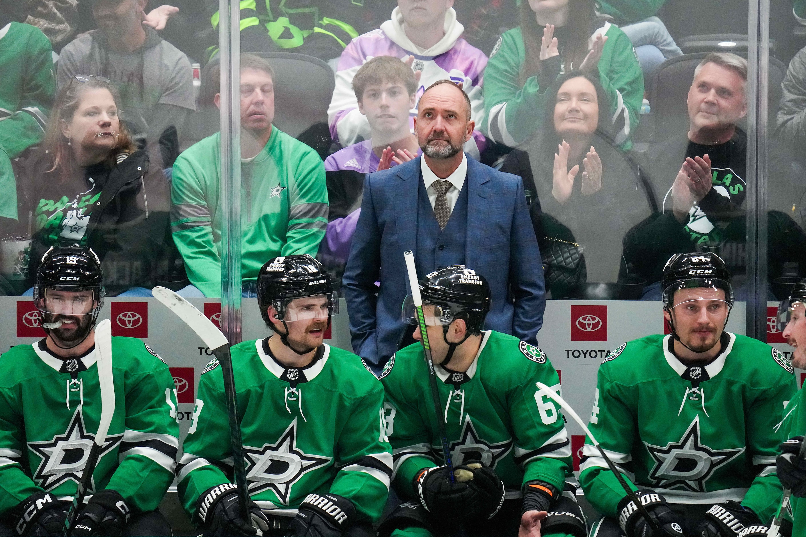 Dallas Stars head coach Pete DeBoer looks on from the bench during the third period of an...