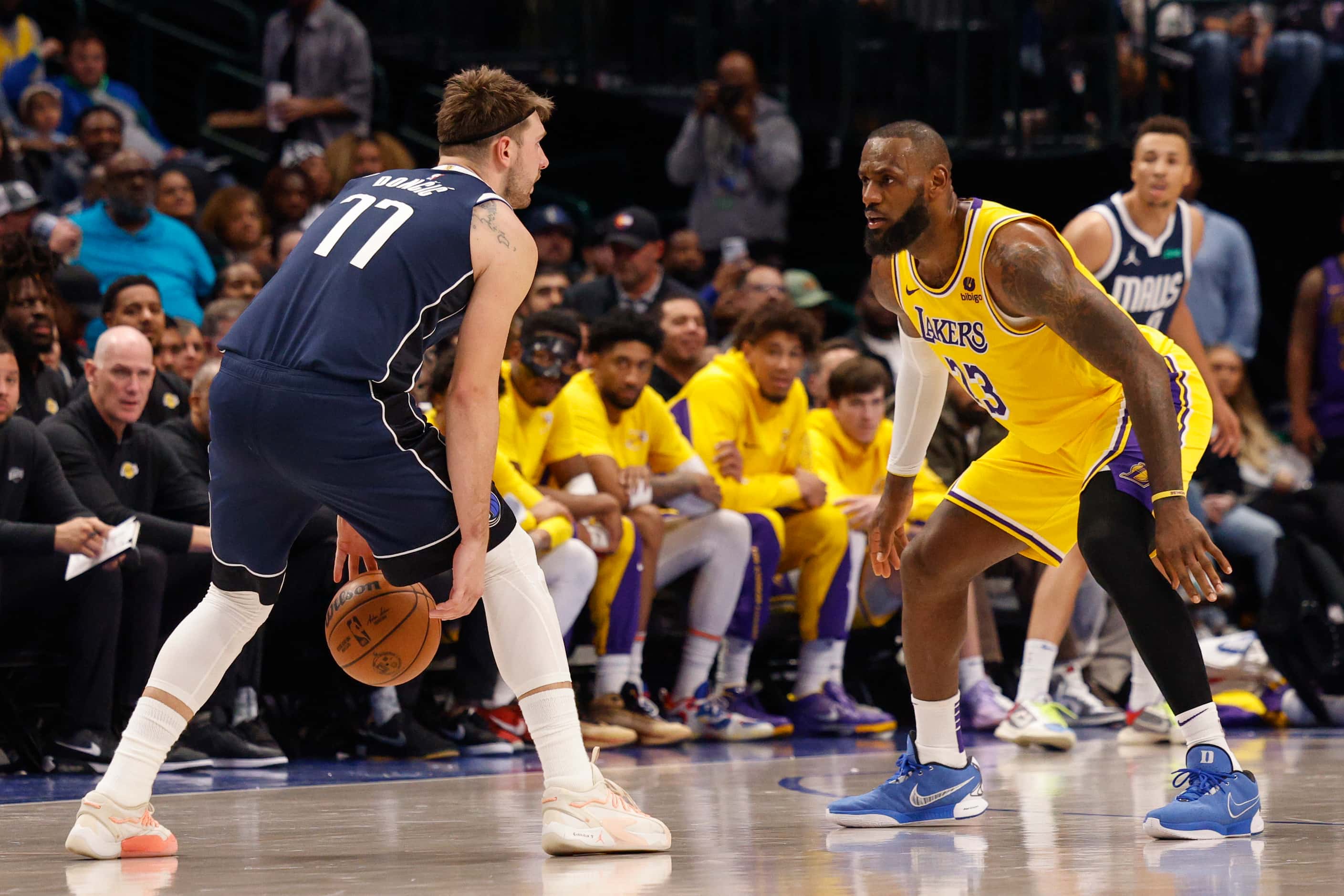 Dallas Mavericks guard Luka Doncic (77) dribbles against Los Angeles Lakers forward LeBron...