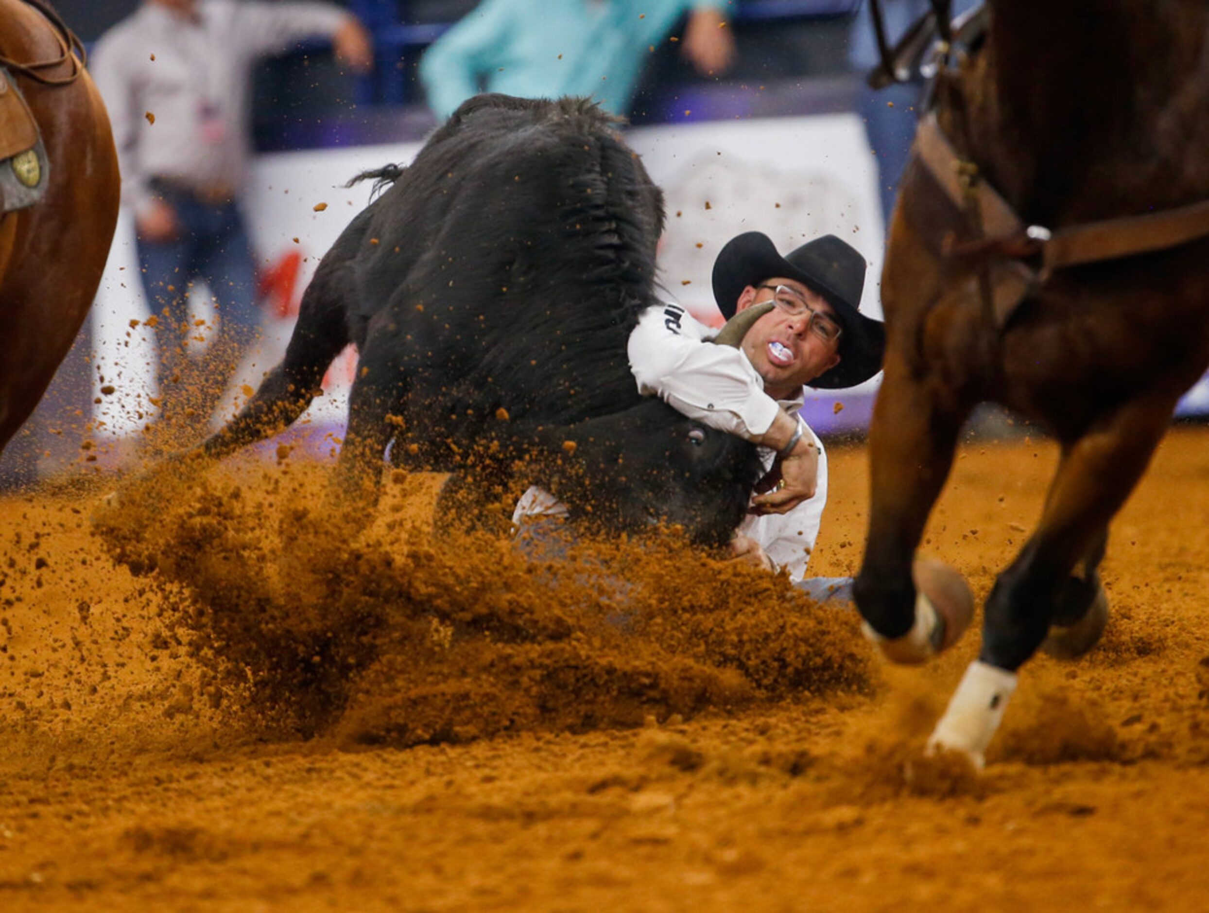 Matt Reeves of Cross Plains, TX competes in the steer wrestling competition of RFD-TV's The...