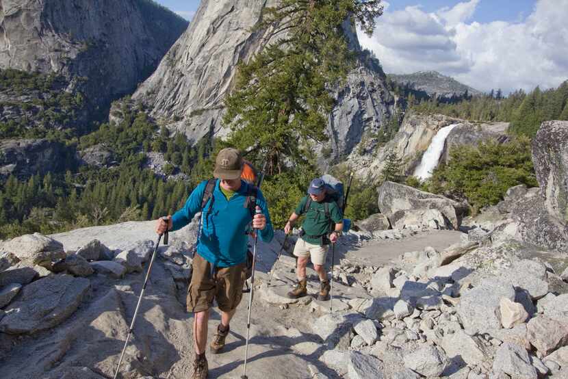 The John Muir Trail offers stunning views of iconic features in Yosemite National Park,...