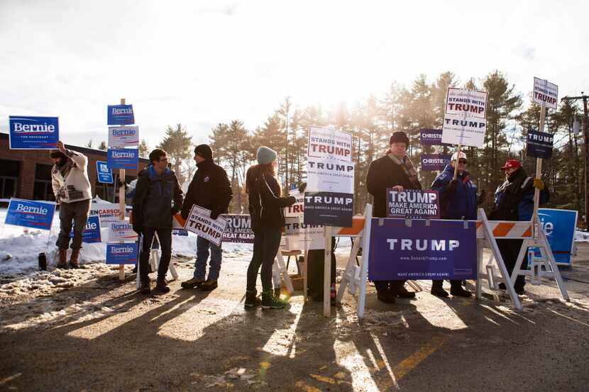  MERRIMACK, NH - FEBRUARY 9: Supporters rally for their chosen candidate outside of the...