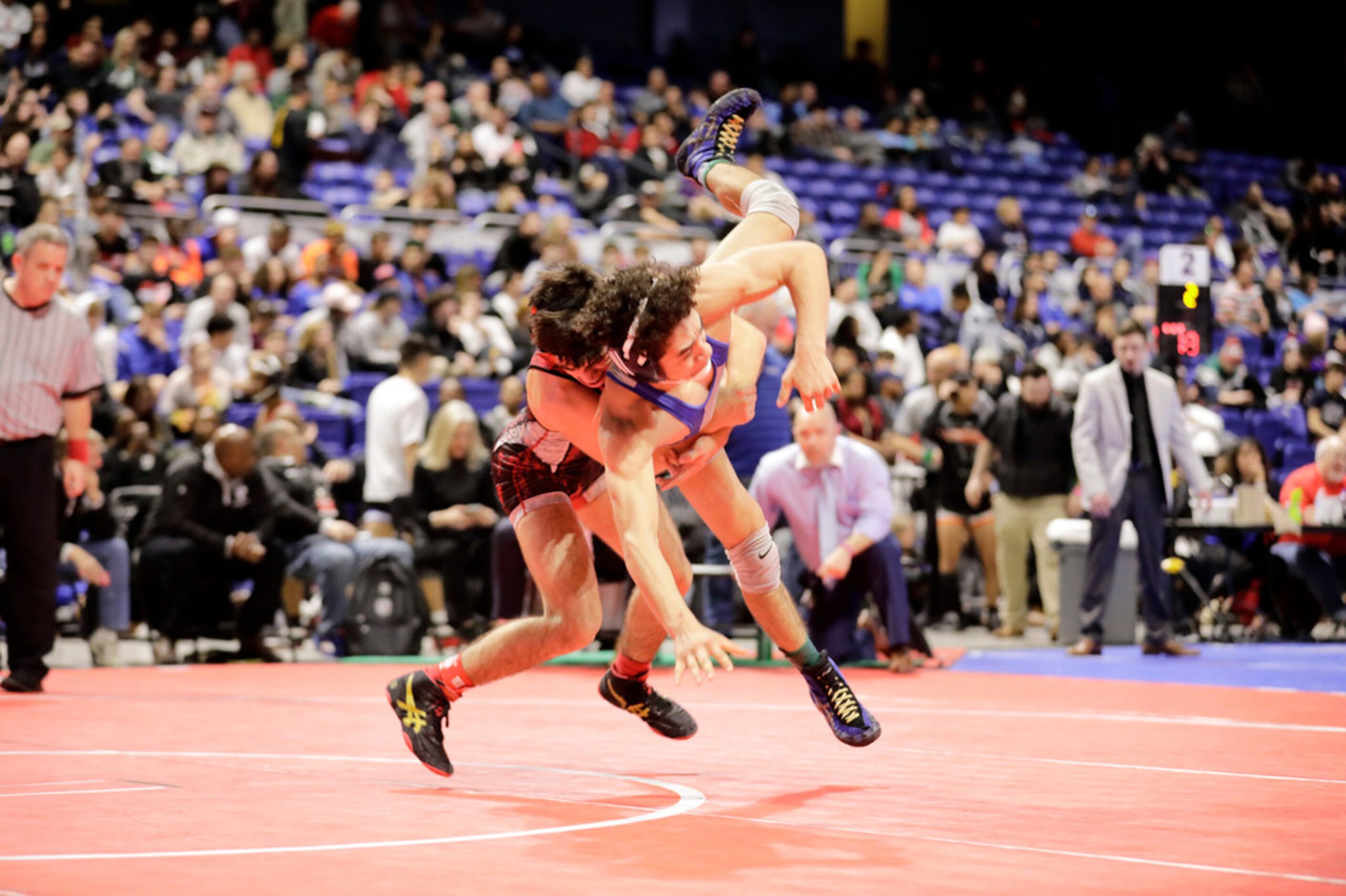 Dominic Chavez of Arlington Martin wrestles during the UIL Texas State Wrestling...