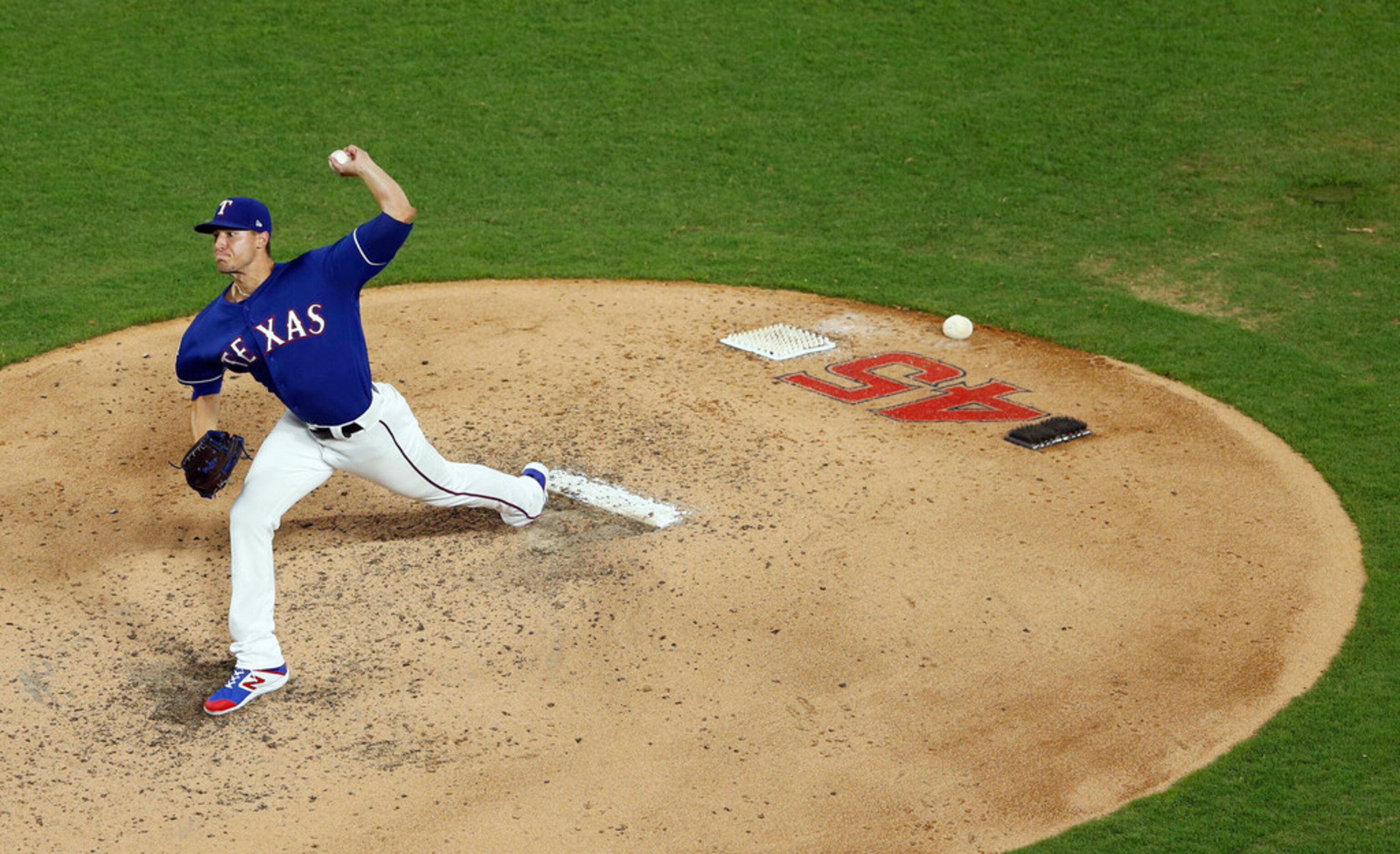 Texas Rangers pitcher Brett Martin (59) pitches during the fifth inning of play against the...