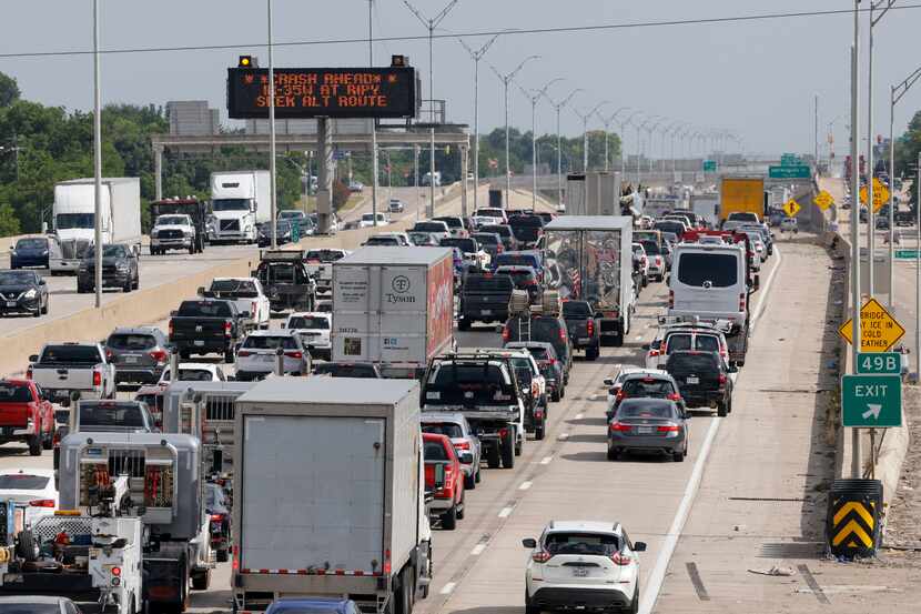 Traffic backs up along southbound Interstate 35W near Hattie Street, Tuesday, July 11, 2023...