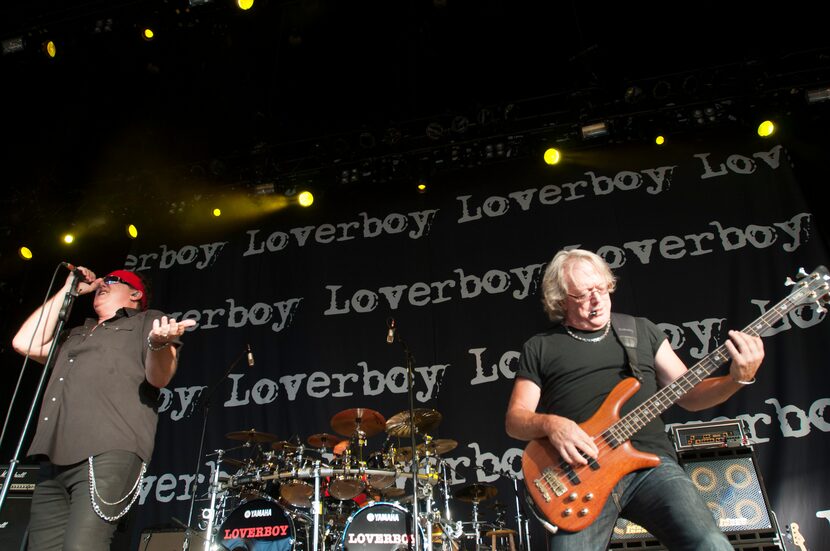 Mike Reno, left, and Ken Sinnaeve of Loverboy perform at the Gexa Energy Pavilion on...