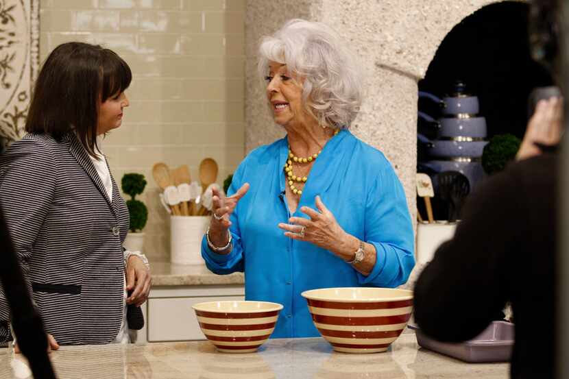 Paula Deen talks to Good Morning Texas personality Paige McCoy Smith while filming a segment...